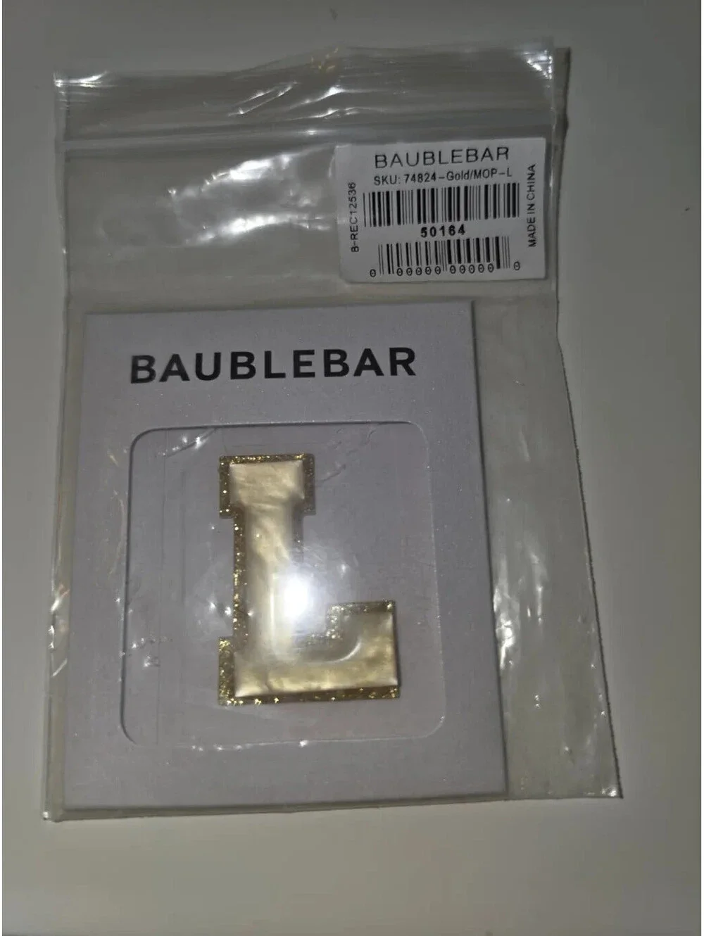 BAUBLEBAR MOTHER OF PEARL GOLD GLITTER LETTER L BAG CHARM STICKER NIP